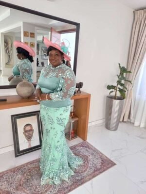 This is a Mint Green Lace Gown