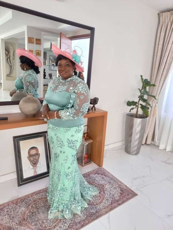 This is a Mint Green Lace Gown