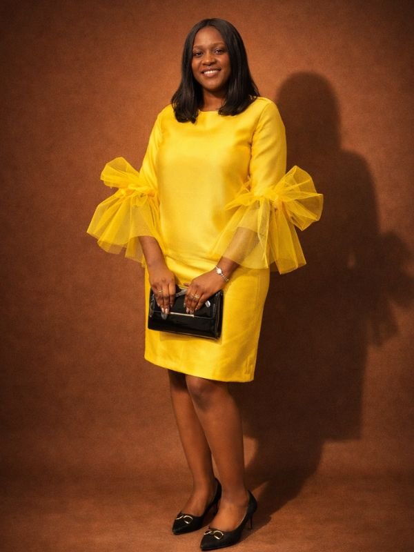 This is Yellow Tulle Sleeve Gown