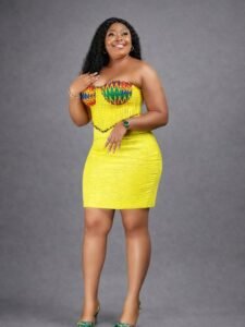 This is Sunburst Kente Glam Dress